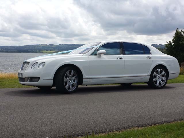 Manns Limousines side view Rolls Royce for prestige wedding car hire West Midlands