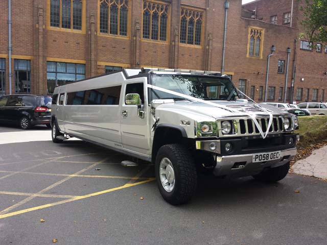 Front view silver hummer limo hire