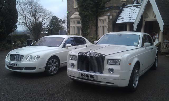Manns Limousines Two models White Rolls Royce