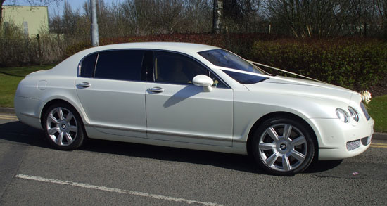 White Bentley Continental Flying Spur for prestige wedding cars Birmingham