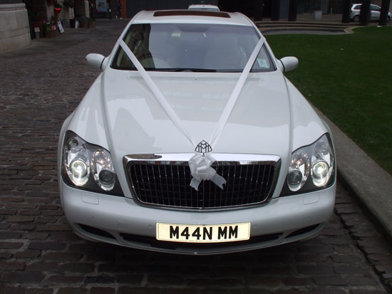 White Maybach Photos (2) Manns Limo White Maybach with White Ribbon for prestige wedding cars