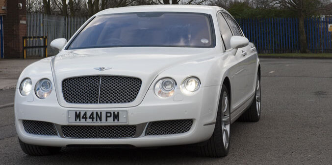 Manns White Bentley Continental Flying Spur for prestige wedding cars Birmingham